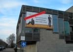 Buisframe en spandoek met extra attentie bord