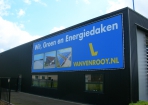 Mega spandoek Van Venrooy reclame in buisframe