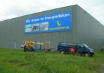 Buisframe en spandoek montage met Hoogwerker